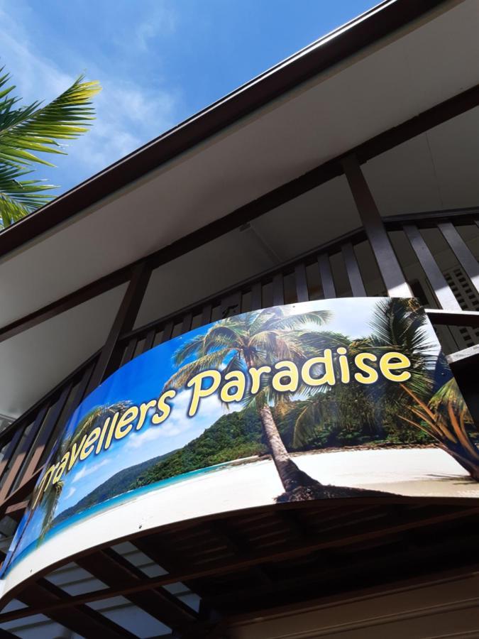 凯恩斯壁虎背包客酒店 凱恩斯 外观 照片 The sign at the entrance of the resort