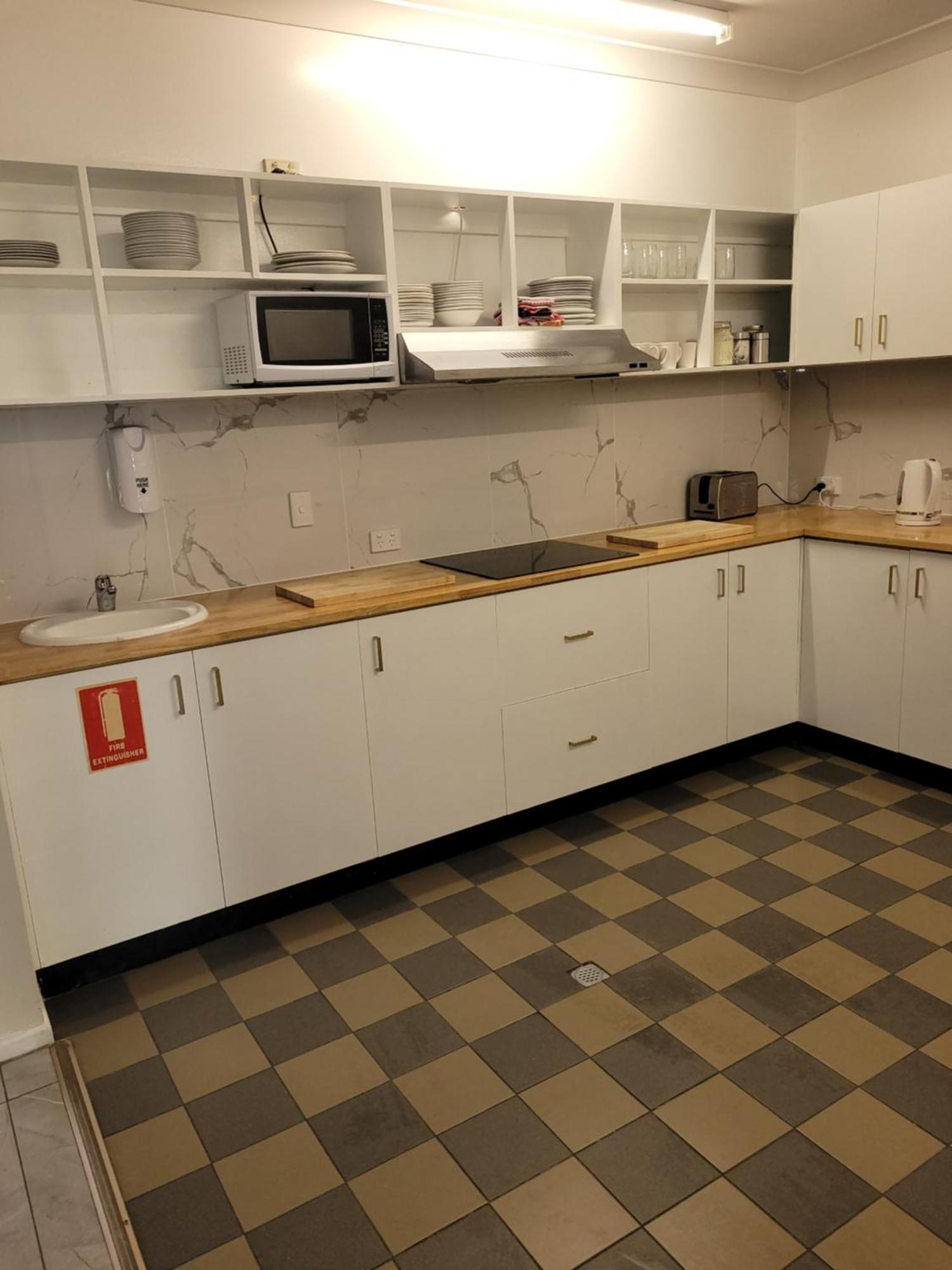 凯恩斯壁虎背包客酒店 凱恩斯 外观 照片 A kitchen in a student apartment