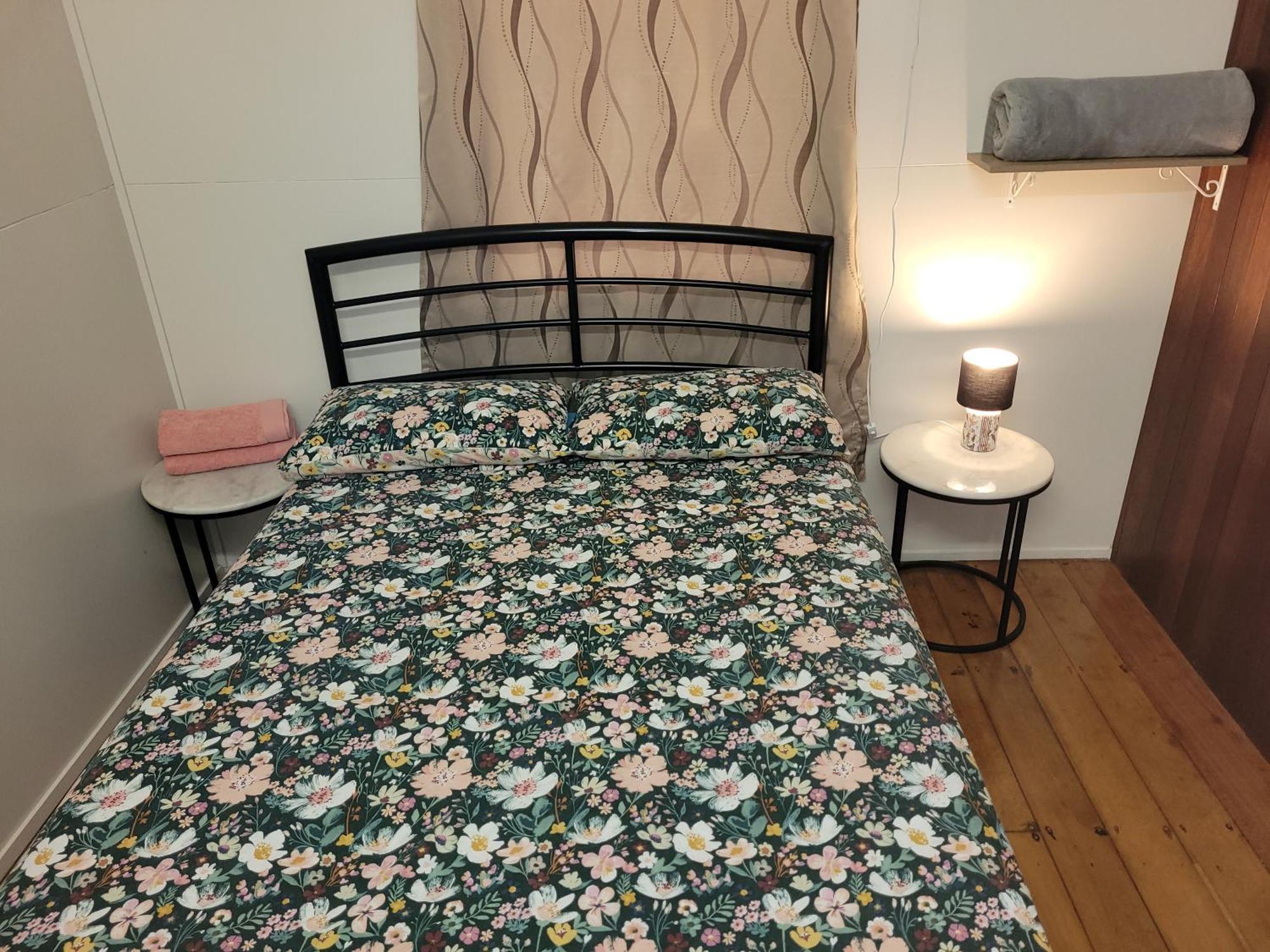 凯恩斯壁虎背包客酒店 凱恩斯 外观 照片 A bed with a mattress