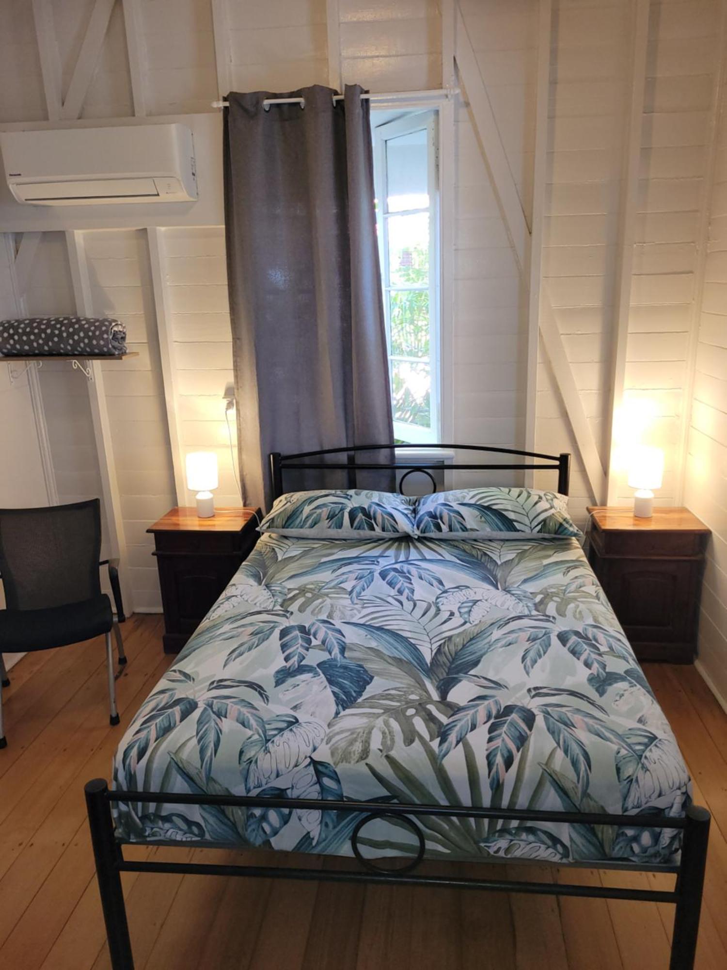 凯恩斯壁虎背包客酒店 凱恩斯 外观 照片 A bedroom in a hostel